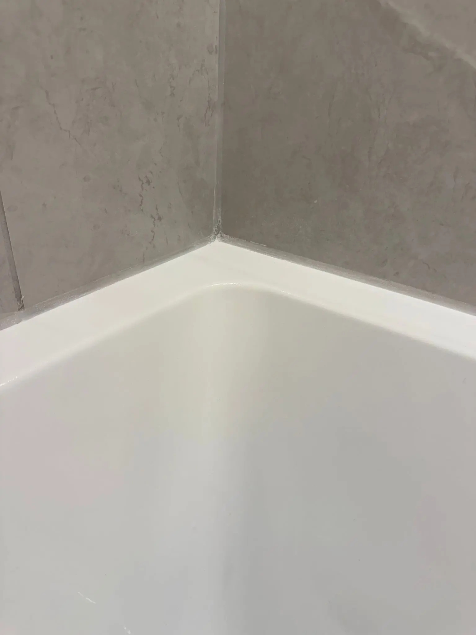 Drill hole in tile after repair